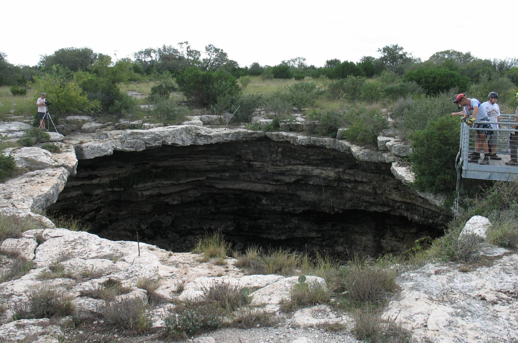 The Devil’s Sinkhole in Texas is a bedrock collapse into an enormous cave chamber. Photo courtesy: NCKRI Staff George Veni.