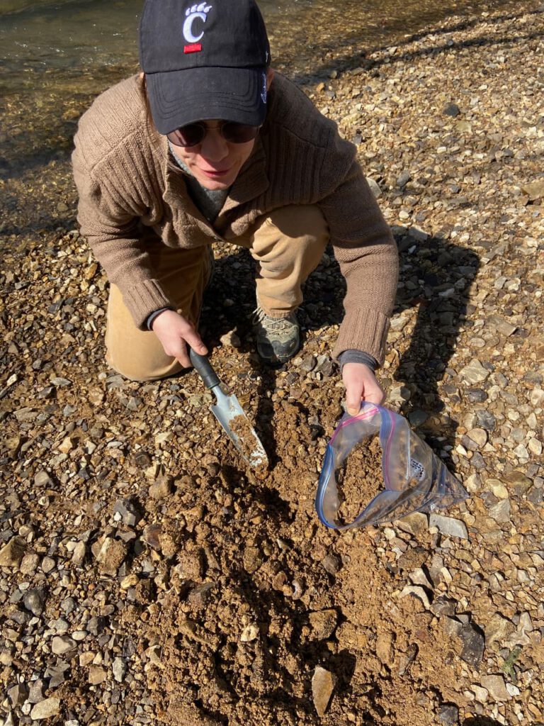 Dr. Dylan Ward, Associate Professor, University of Cincinnati, seen researching a sinkhole plain in Kentucky.